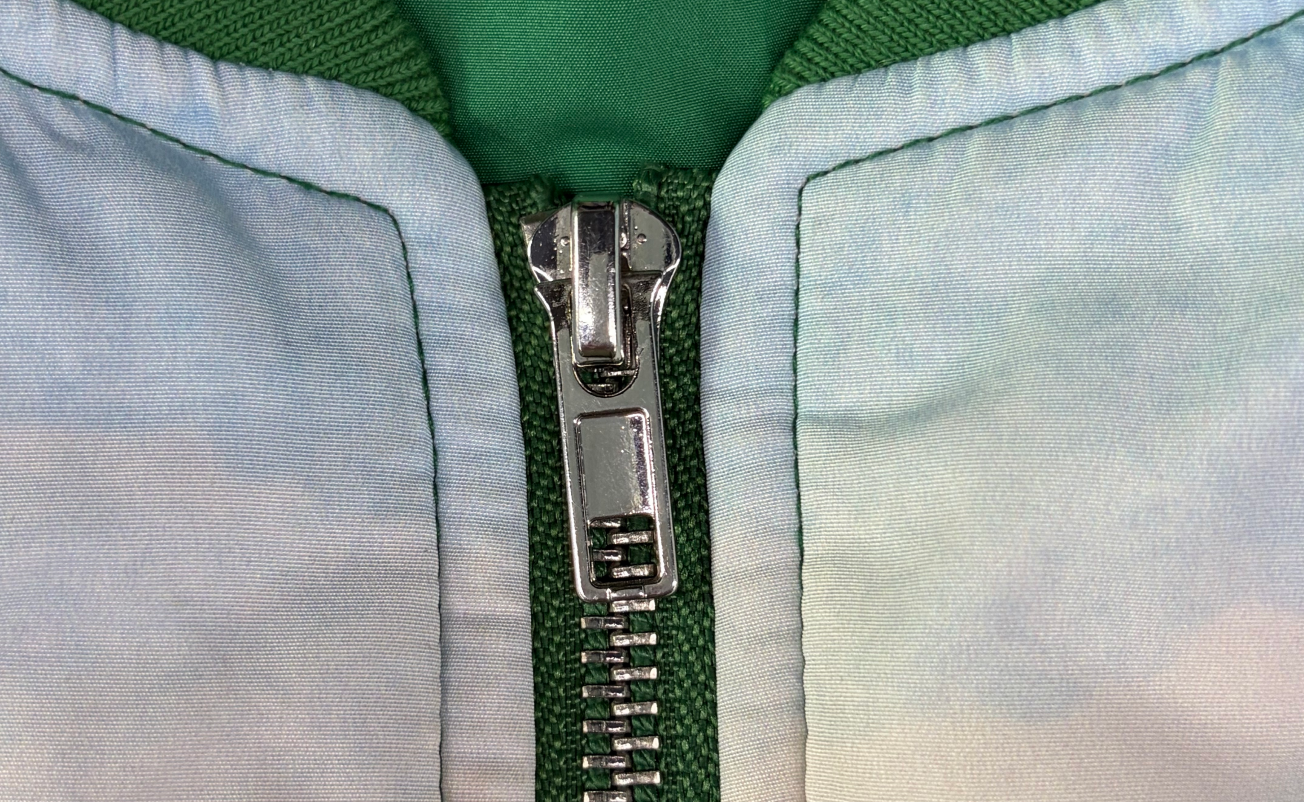 Custom bomber jacket zipper pull detail