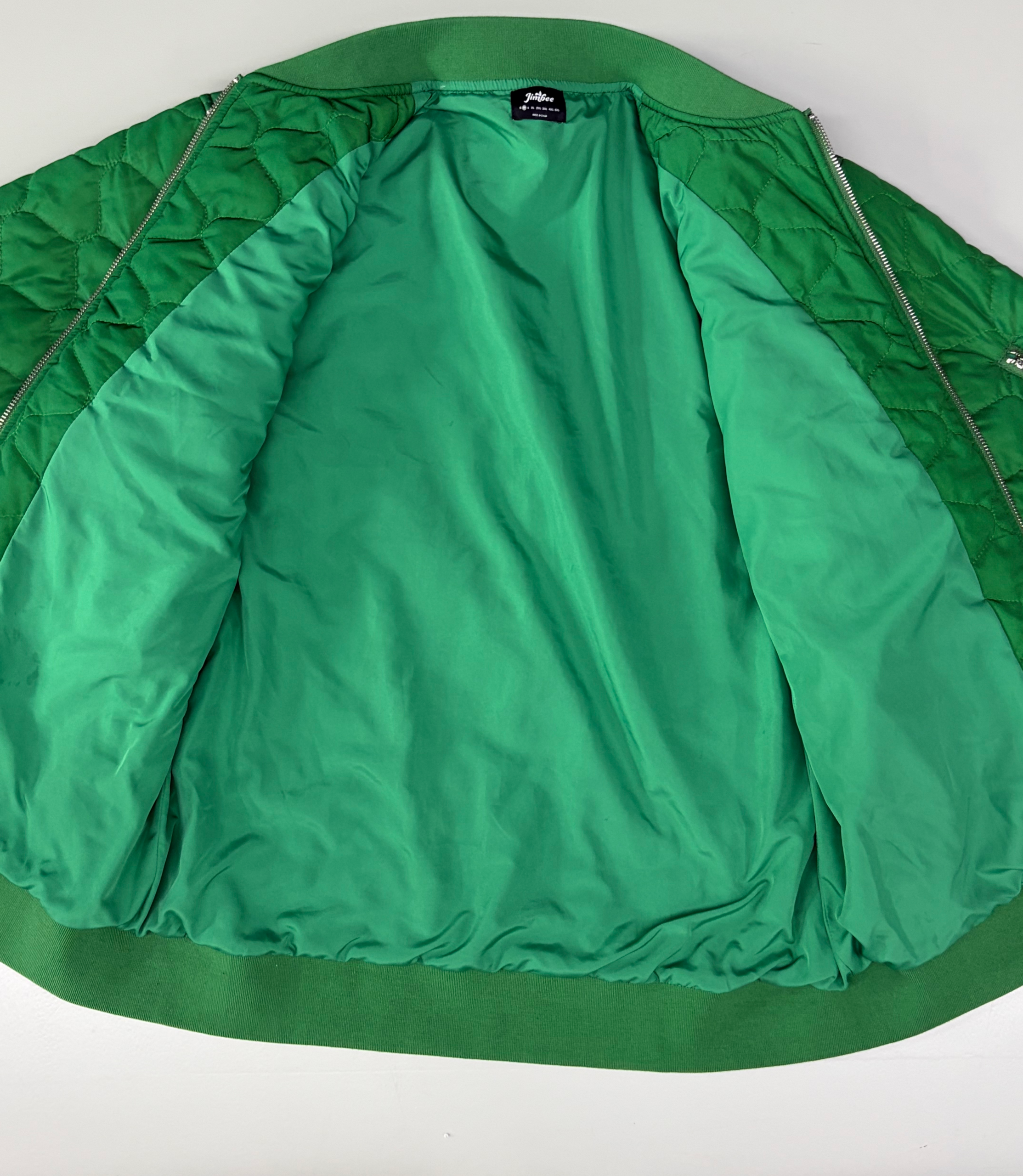 Bomber jacket zipper lining pocket and fabric details