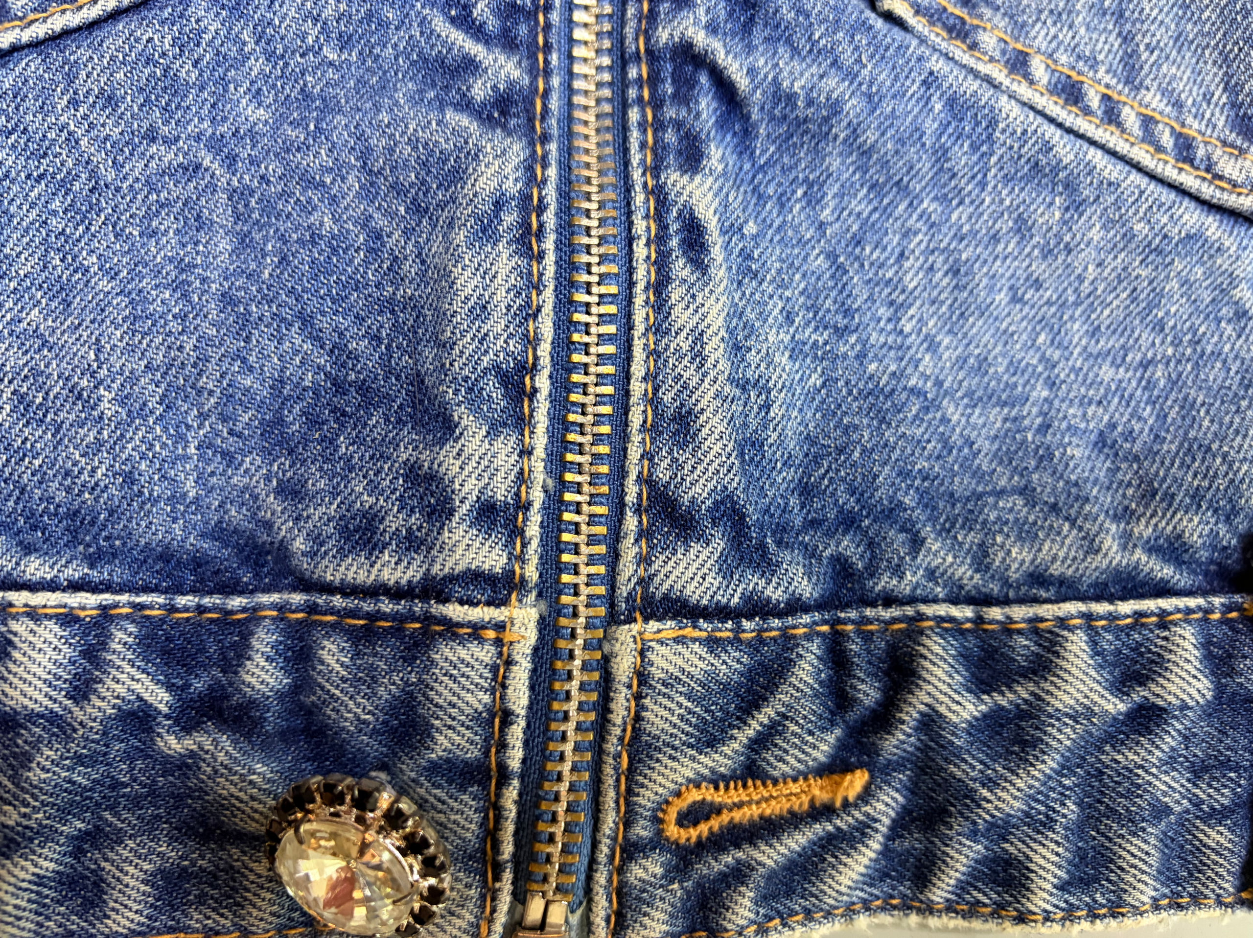 Custom hardware details for denim jackets