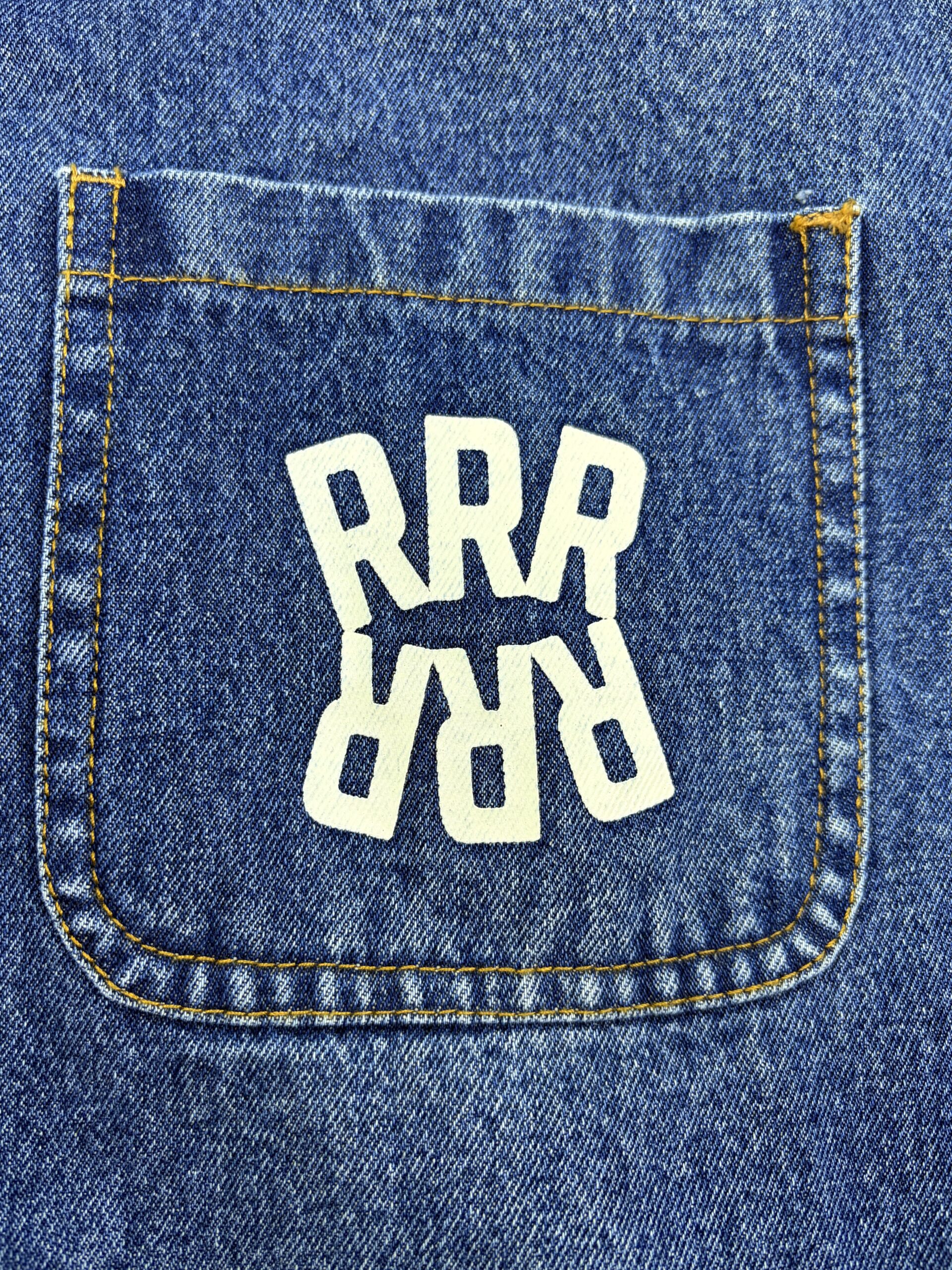 Screen print graphics on a custom denim jacket