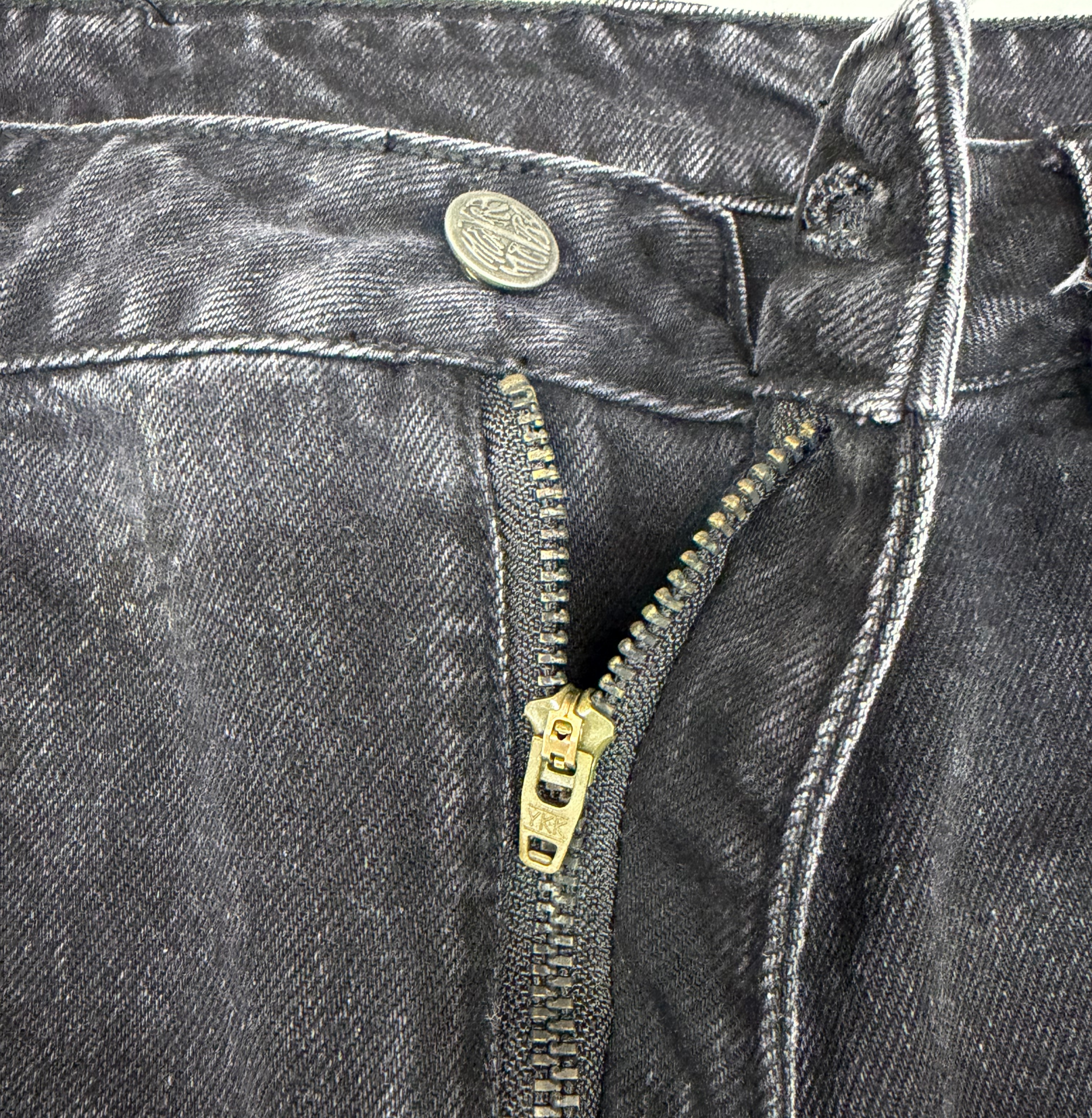 Black wash denim jeans detail