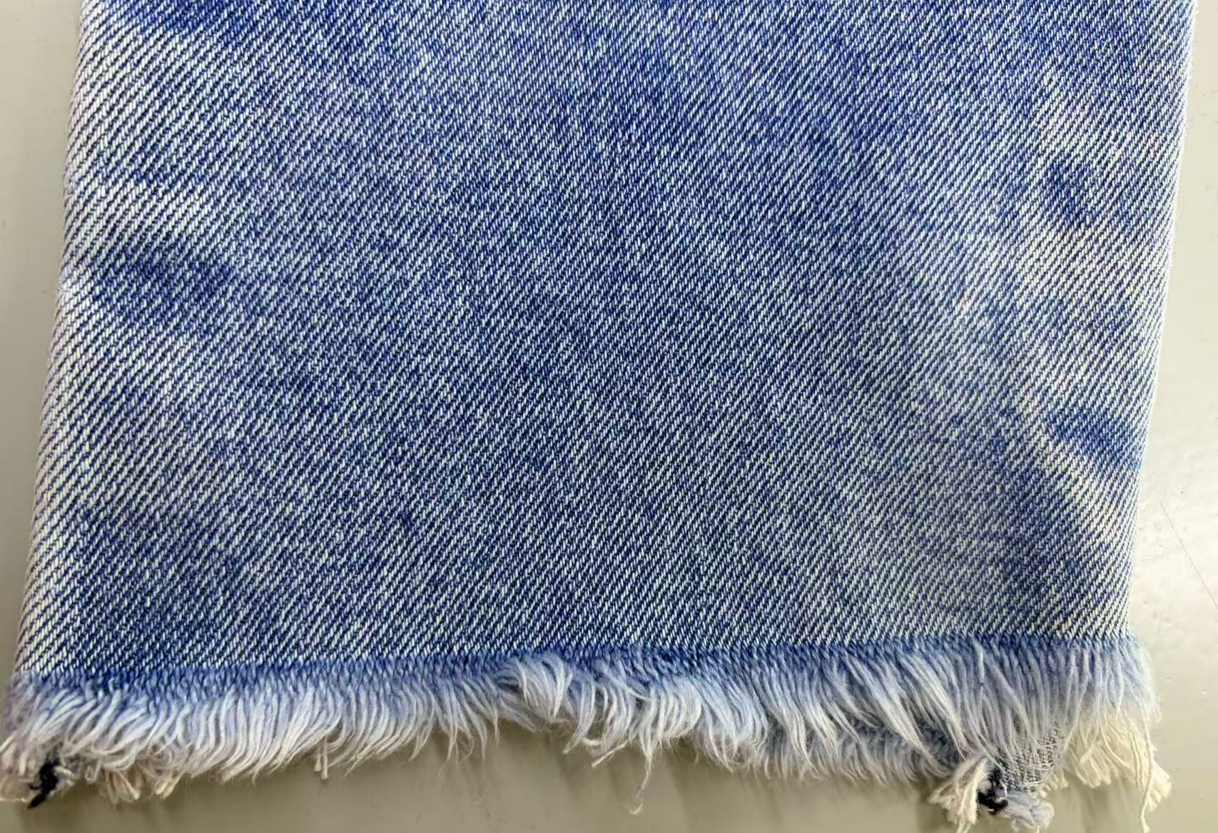Denim shorts raw hem detail