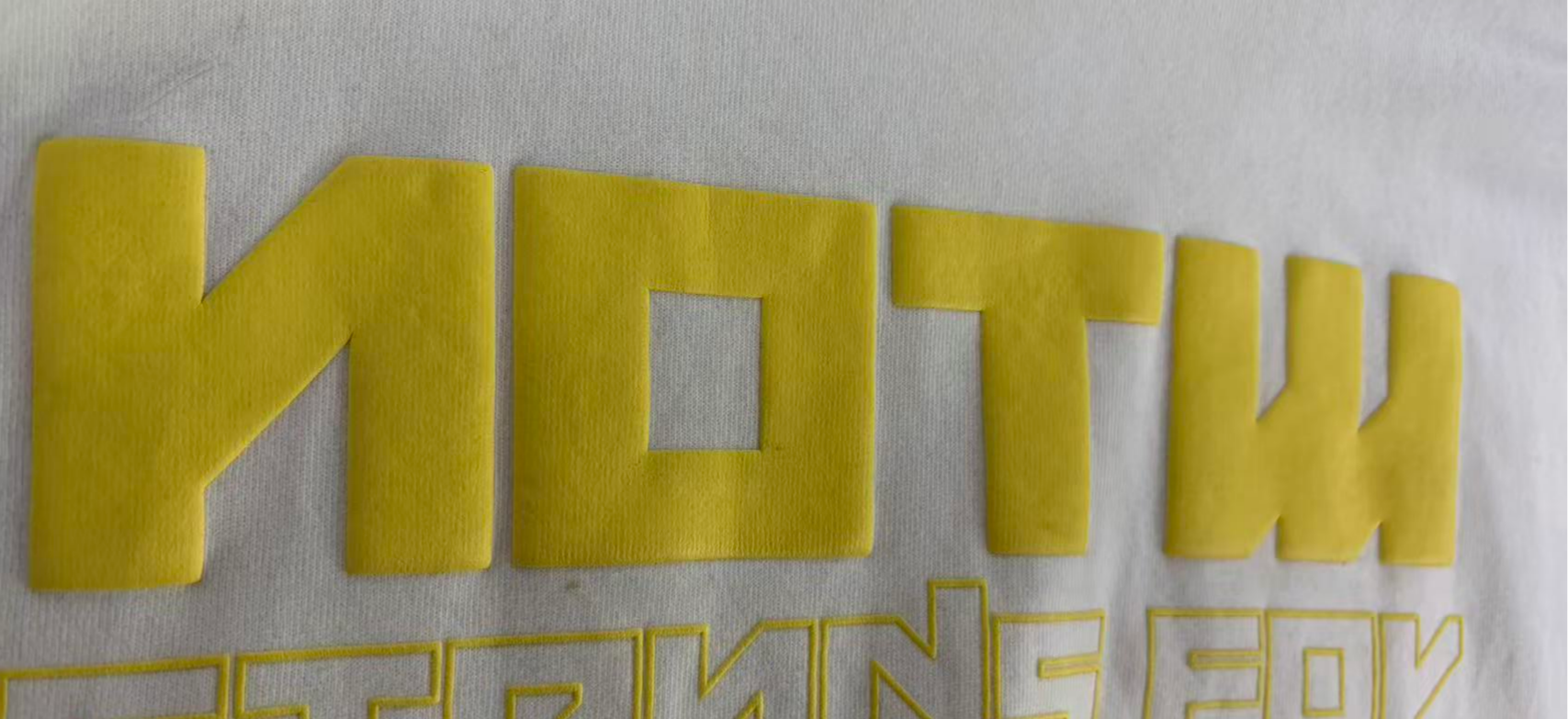 Puff printing raised detail