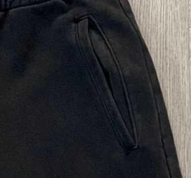 Side pocket construction detail on custom joggers