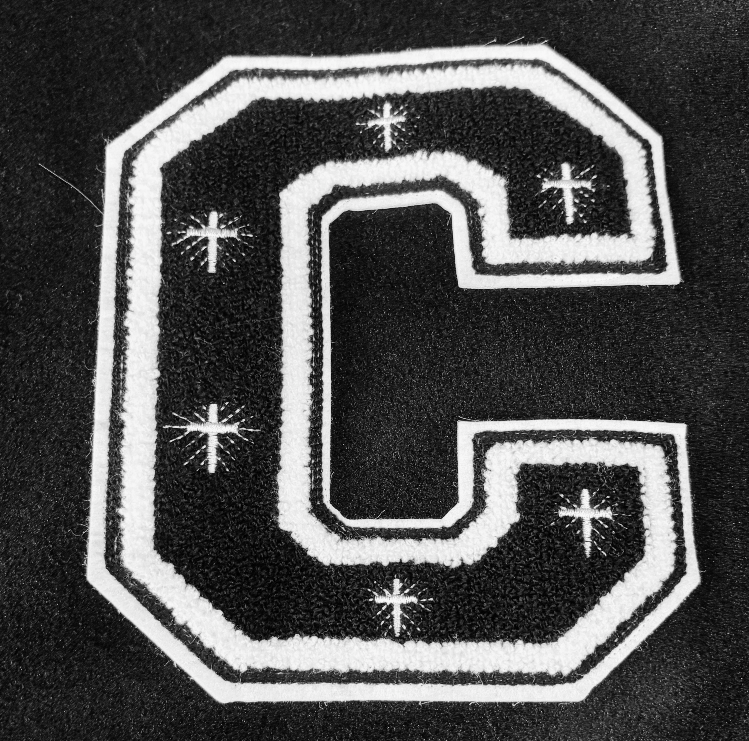 Chenille patch detail on custom varsity jacket