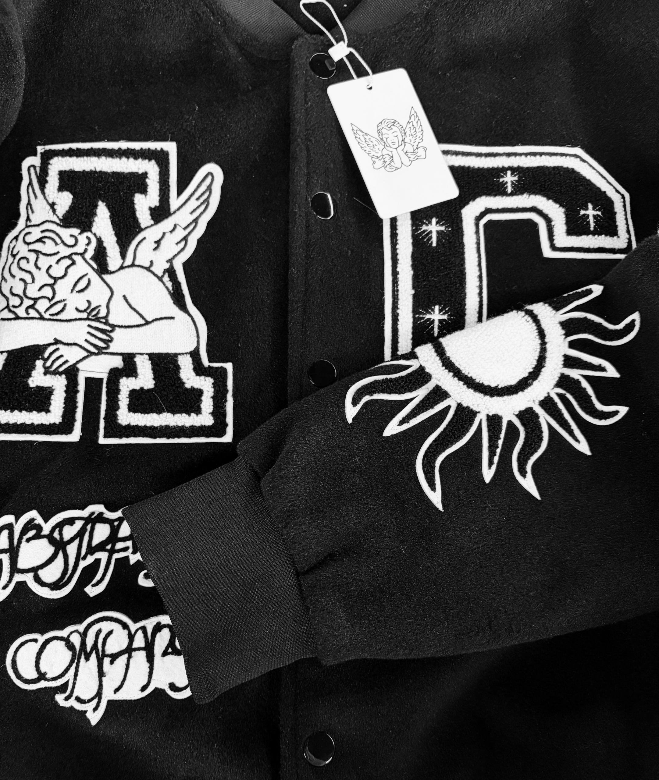 Varsity jacket fabric rib trim and snap button details
